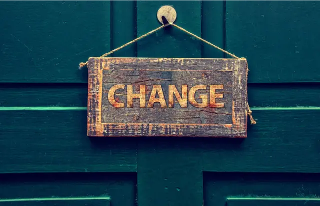 How can business coaching accelerate change management?